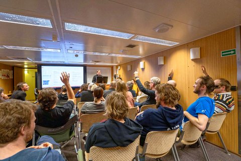 Every evening there is a briefing for the next day and the opportunity to volunteer for many tasks. Photo: Lianna Nixon, University of Colorado